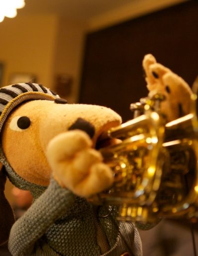 Sir-Roughie-De-Hound-warms-up-for-his-trumpet-solo